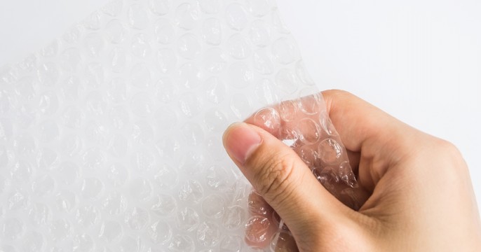 Hand holding bubblewrap